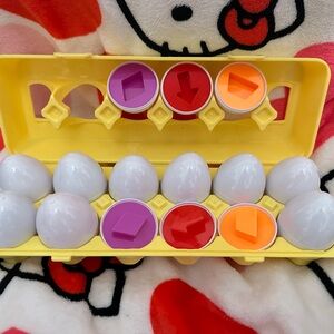 Kids Shape Matching Egg Toy Set - Yellow with Purple, Red, Orange Accents